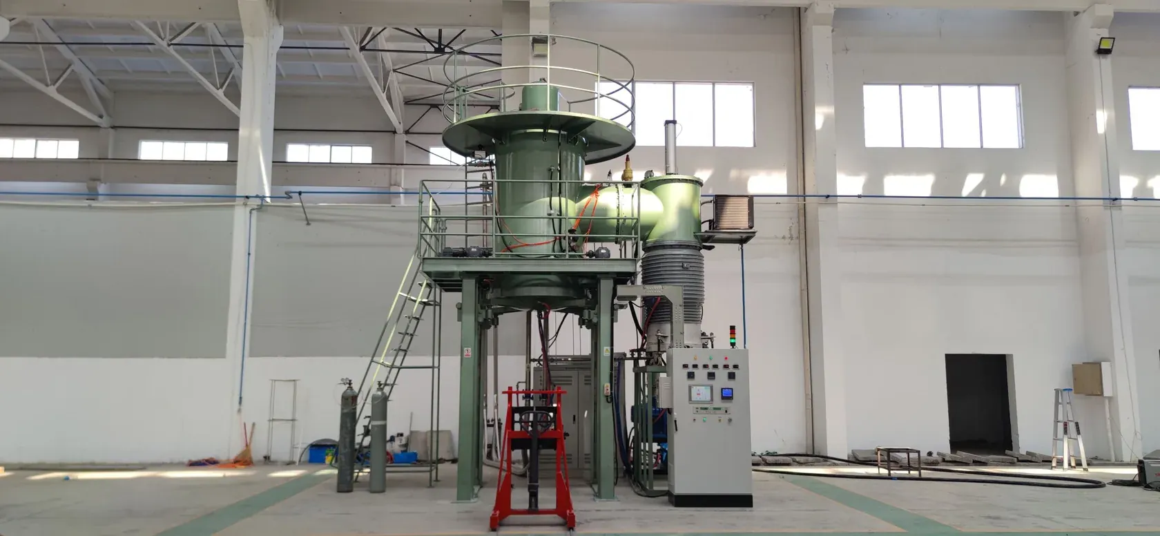 VTSL bottom-loading vacuum sintering furnace installed in a production workshop