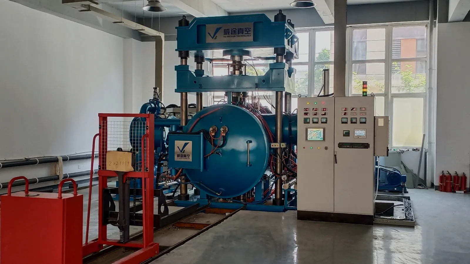 VTM vacuum joining furnace system with hydraulic press, chamber, and process control cabinet