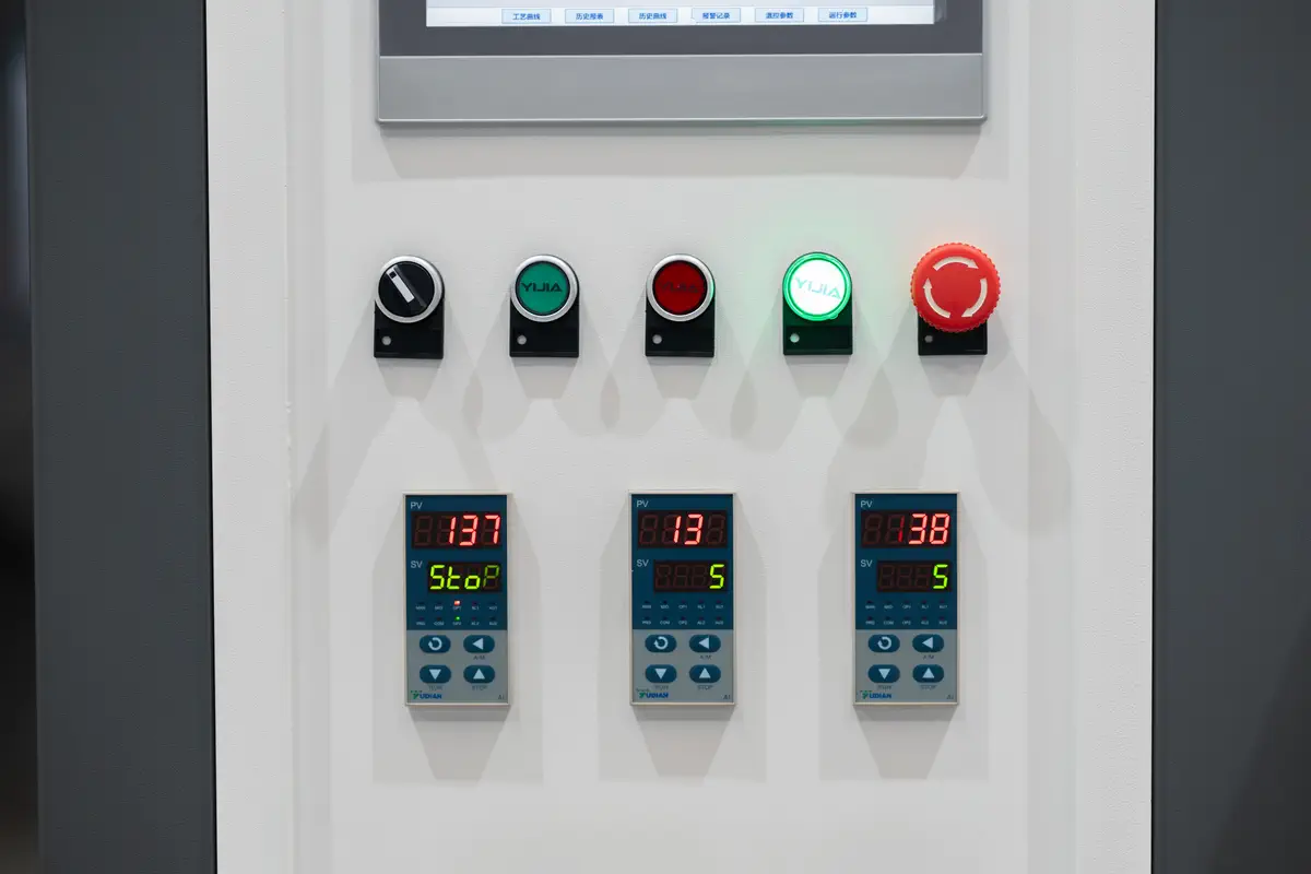 Temperature controllers and operating controls on the HVF-1350 sintering furnace