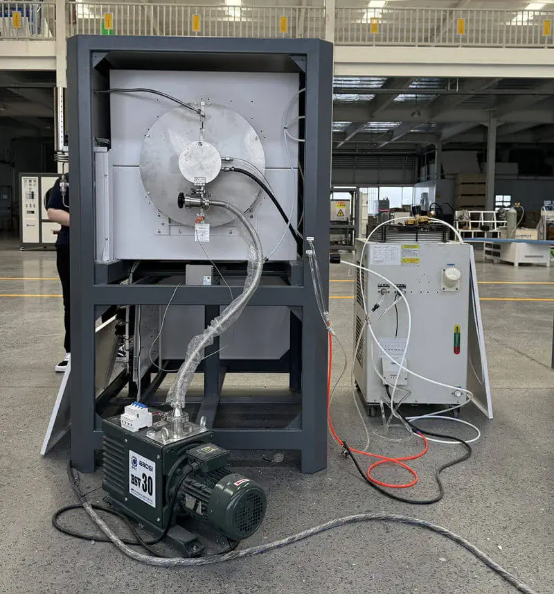 Rear view of HQH-1200 with vacuum pump, cooling unit and process connections