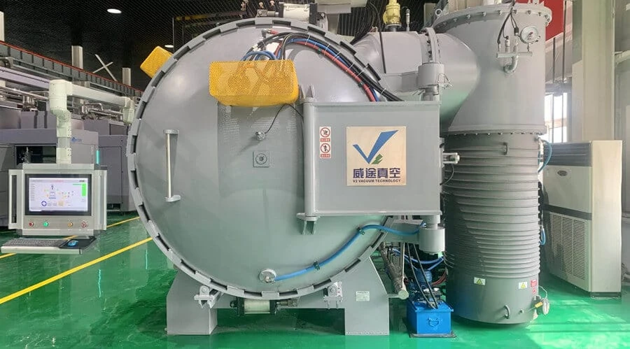 Complete SYNHTE vacuum annealing furnace with chamber door, base, control cabinet and connected vacuum equipment