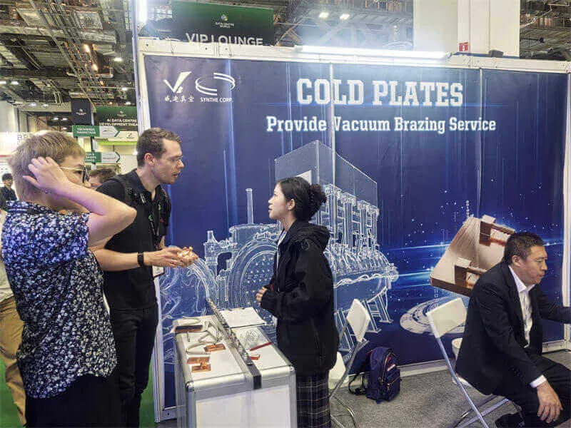 SYNHTE vacuum furnace team at an industrial exhibition
