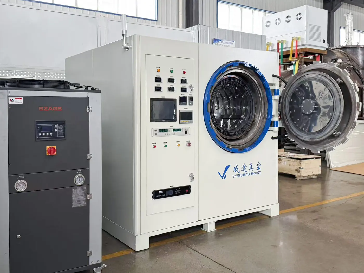 VTHB-334 compact multi-purpose vacuum furnace with open chamber and integrated control cabinet